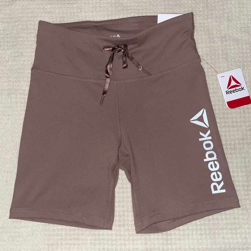 Womans bike shorts. 7” inseam. Back pocket. New with tags